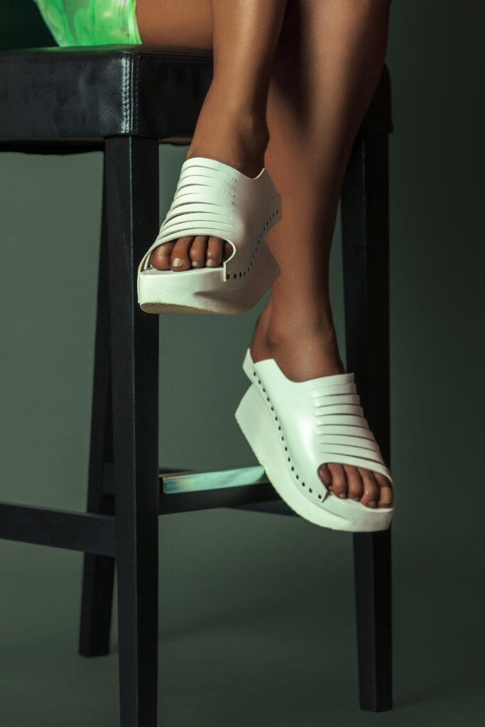 Closeup of white summer sandals.