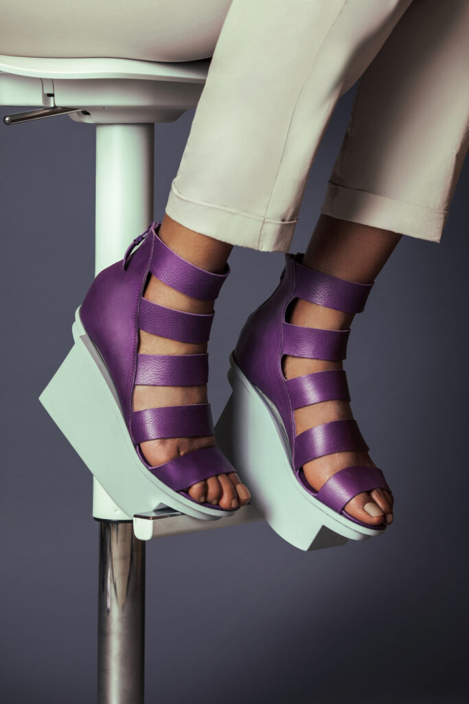Summer sandals for women. Closeup of purple sandals.