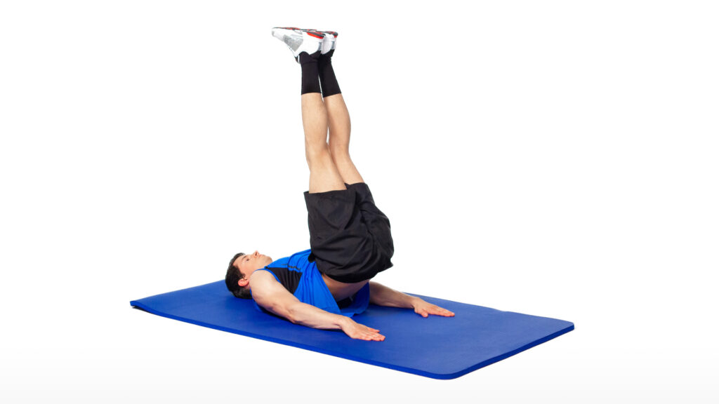 athlete performs hip lifts for core training