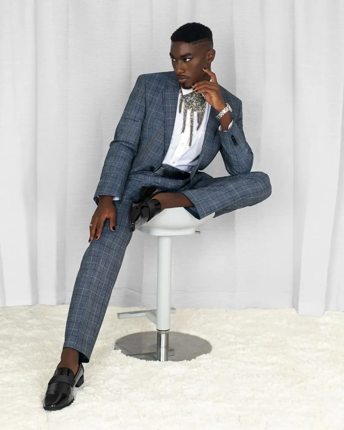 Blue suit portrait exploring masculine softness and personal style