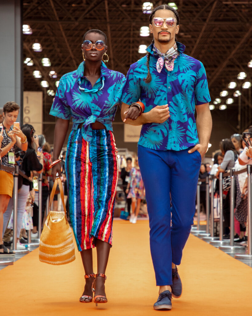 New york fashion in summer – Black couple in coordinated blue summer outfits on NYC runway.