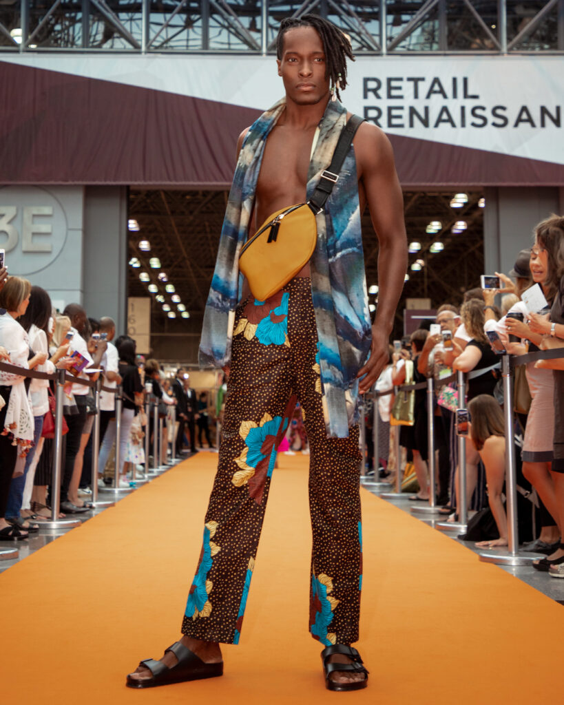 New york fashion in summer – sleeveless shirt and patterned pants look.