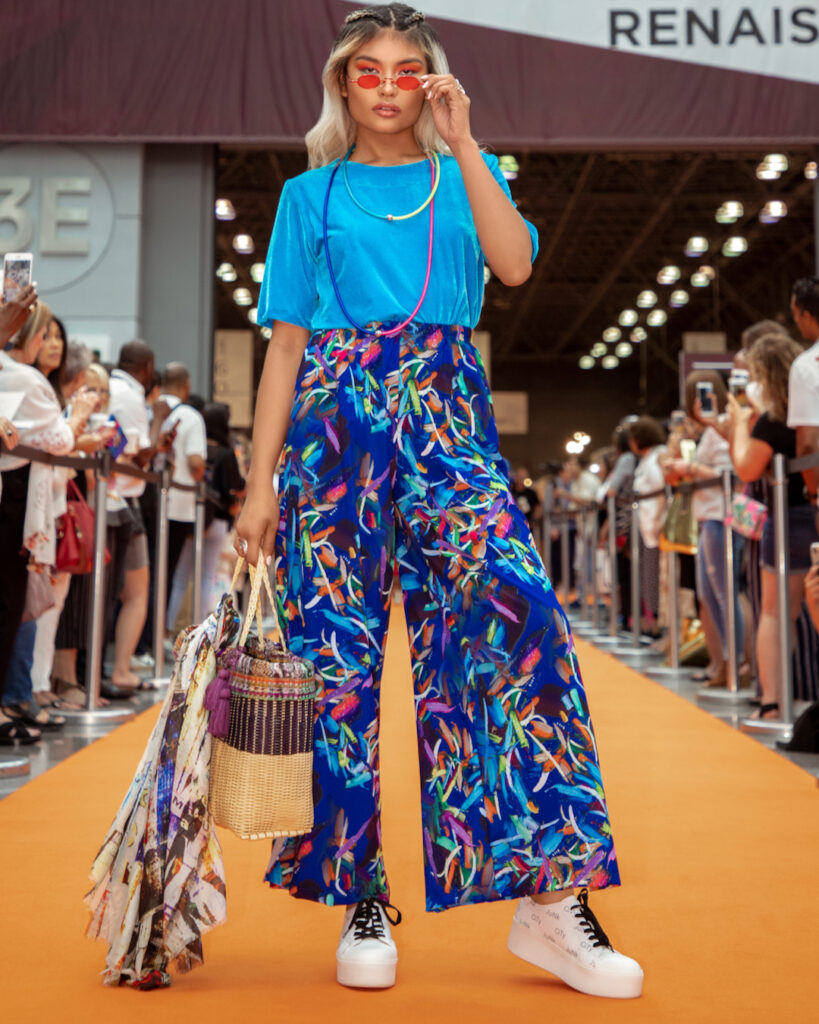 New york fashion in summer – colorful pants and sunglasses look.
