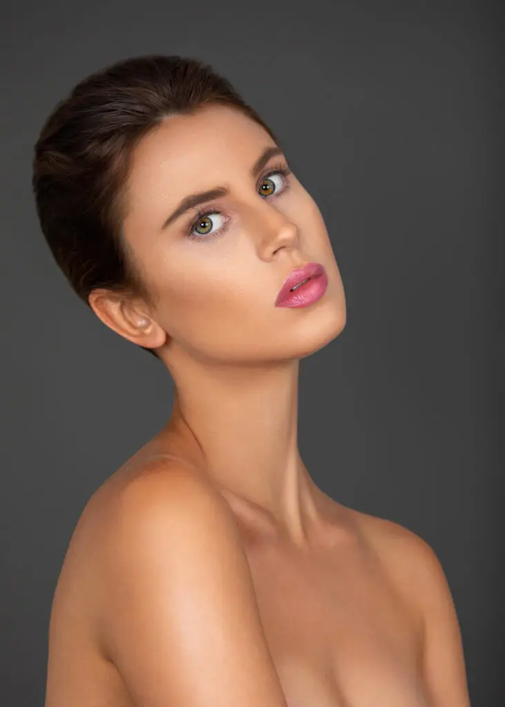 Close beauty portrait of Rebecca expressing authentic confidence
