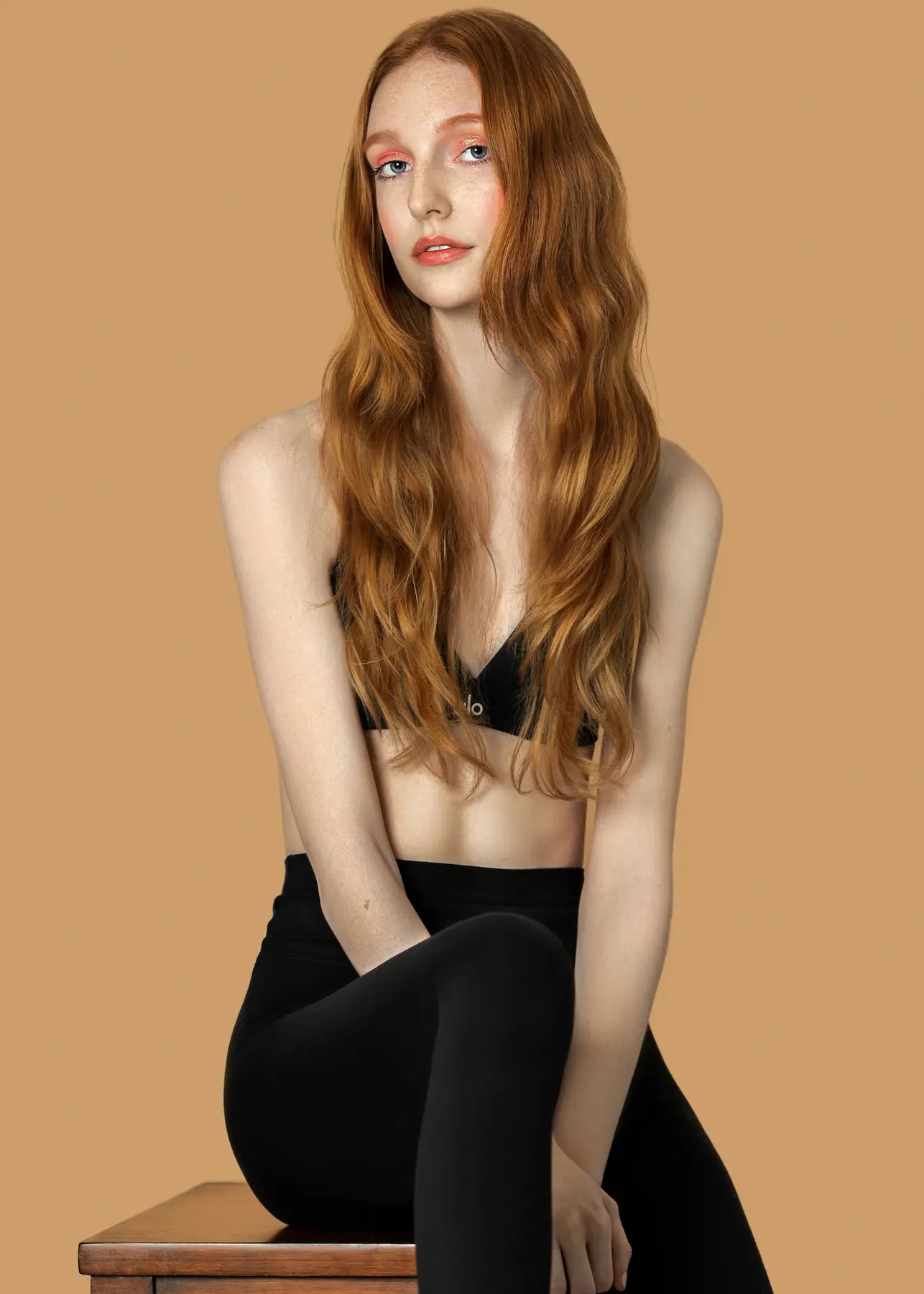 Brisbane wearing a black look in a modern beauty portrait