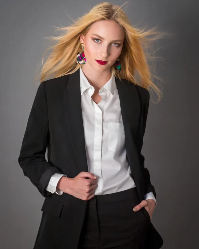 Fashion model in a tailored black suit and white shirt