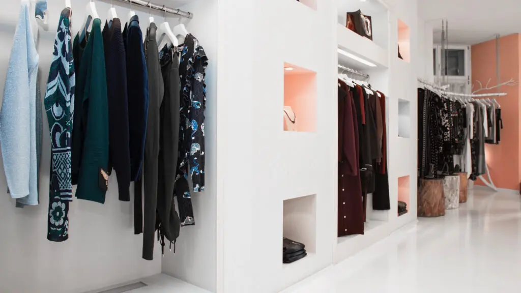 Clothing rails and minimalist interior at Rebecca Concept Store Berlin