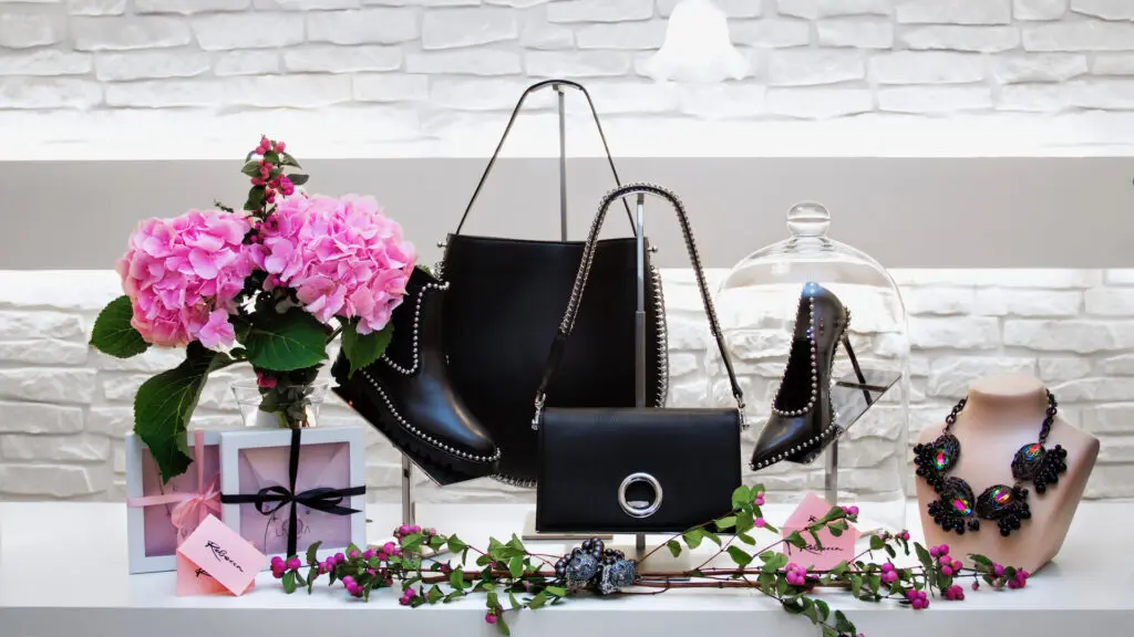 Designer handbags, jewelry and flowers displayed inside Rebecca Concept Store Berlin